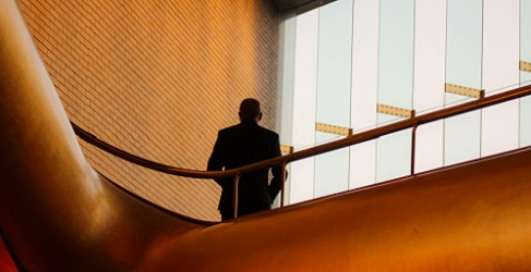 Person standing by a window