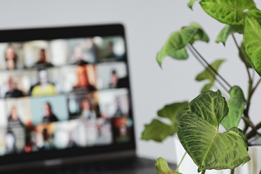 A computer with people using a video call